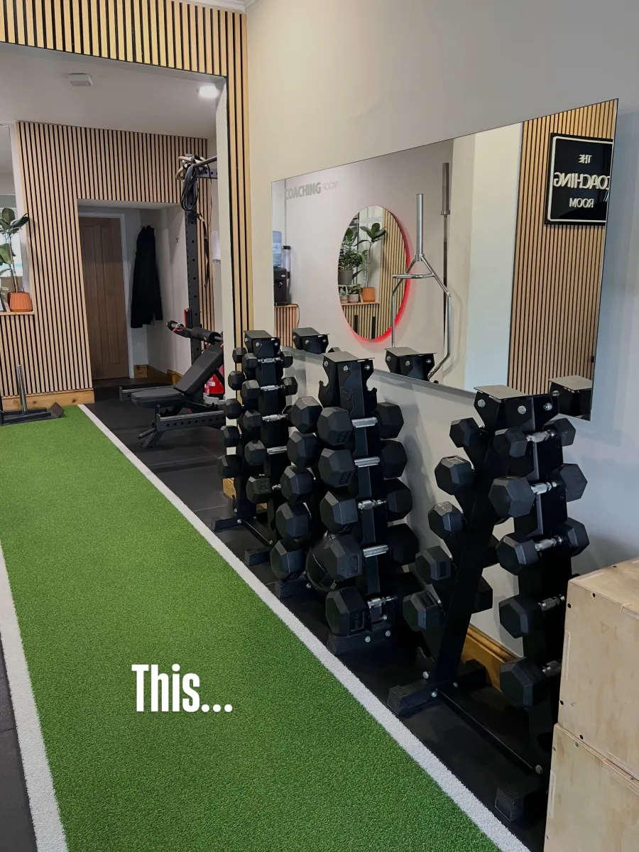 Instagram post: dumbbell racks along the turf in the studio