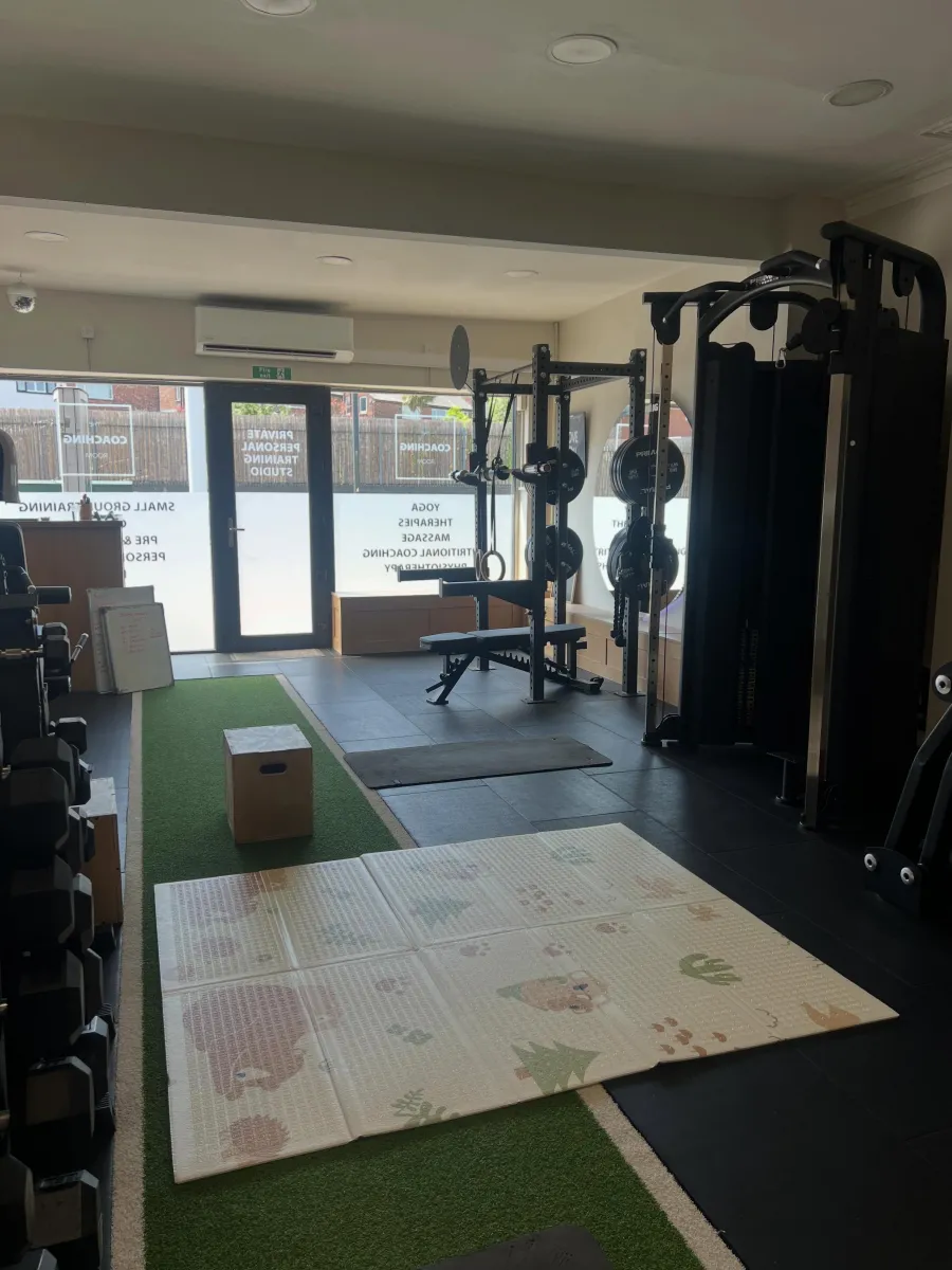 Instagram post: the gym floor set up with a baby play mat