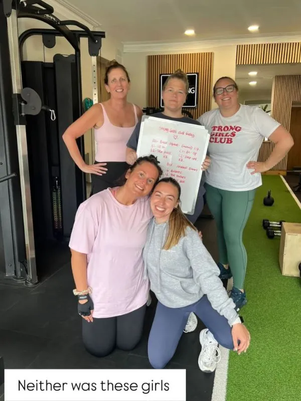 A group of smiling members in the gym, captioned: Neither was these girls