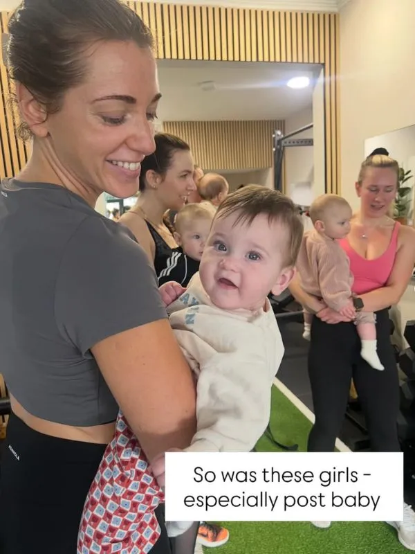 A trainer coaching a member through an exercise, captioned: So did these girls
