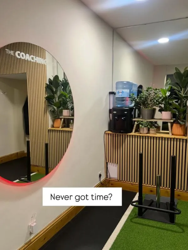The studio entrance with plants and mirror, captioned: Never got time?